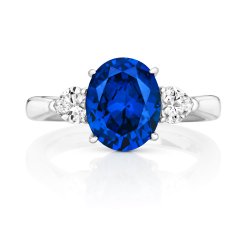 Silver Blue Oval Centre Stone Claw Set With Heart Shape Sides Trilogy Ring LRG0025S