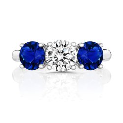 Round Centre Stone Claw Set With Blue Round Sides Trilogy Ring LRG0041S