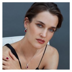 Red Oval Centre Stone Claw Set With Heart Shape Sides Trilogy Ring LRG0025R
