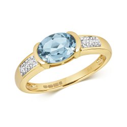 Diamond & Light Swiss Blue Topaz Oval With Grain Set Shoulders Ring In 9ct Gold 