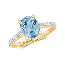 Diamond & Light Swiss Blue Topaz Oval With Grain Set Shoulders Ring In 9ct Gold 