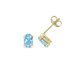 Blue Topaz Oval Claw Set Studs In 9ct Gold 