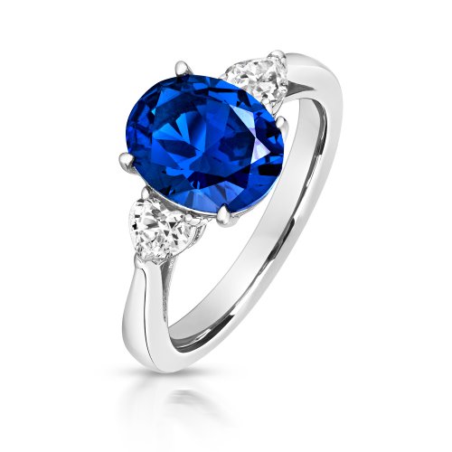 Silver Blue Oval Centre Stone Claw Set With Heart Shape Sides Trilogy Ring LRG0025S
