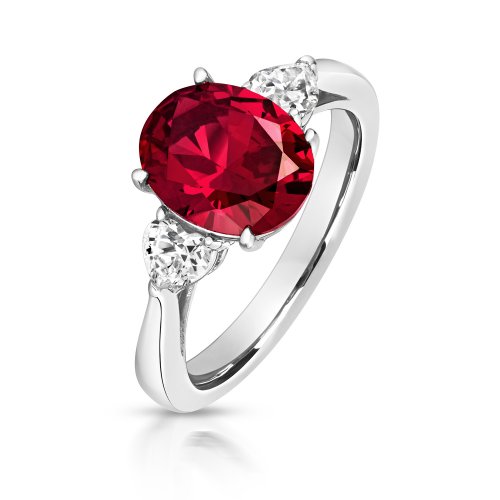 Red Oval Centre Stone Claw Set With Heart Shape Sides Trilogy Ring LRG0025R